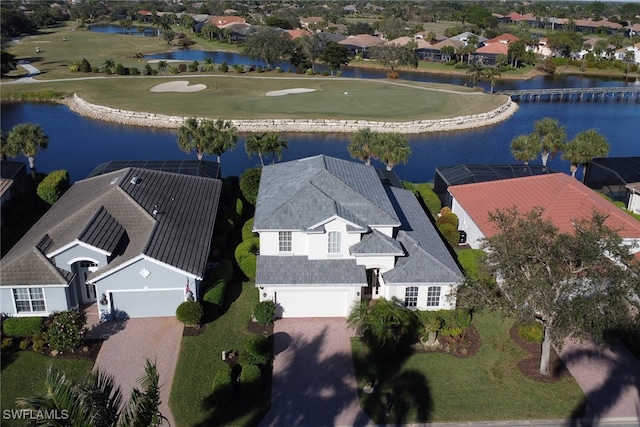 bird's eye view with a water view