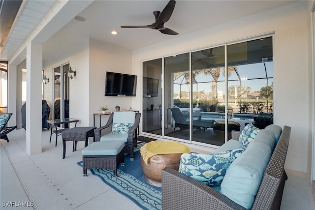 view of patio / terrace with grilling area, ceiling fan, outdoor lounge area, and glass enclosure