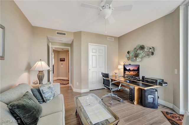 office area featuring hardwood / wood-style floors and ceiling fan