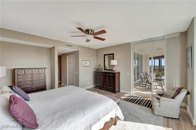 bedroom featuring ceiling fan, access to exterior, and light hardwood / wood-style flooring