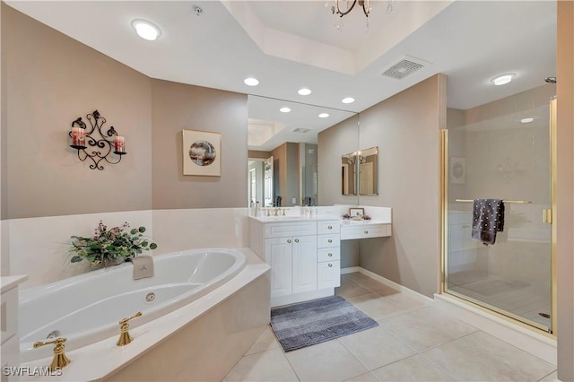 bathroom with tile patterned floors, vanity, and independent shower and bath