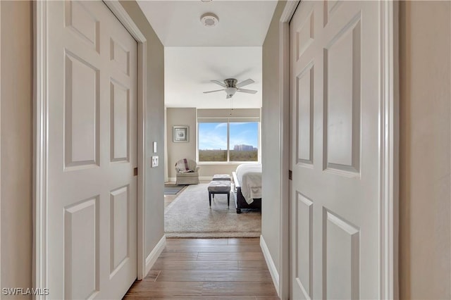 hallway featuring light hardwood / wood-style floors