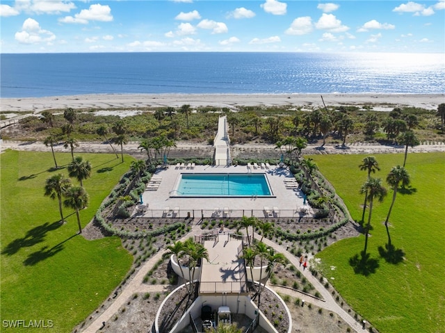 aerial view with a beach view and a water view