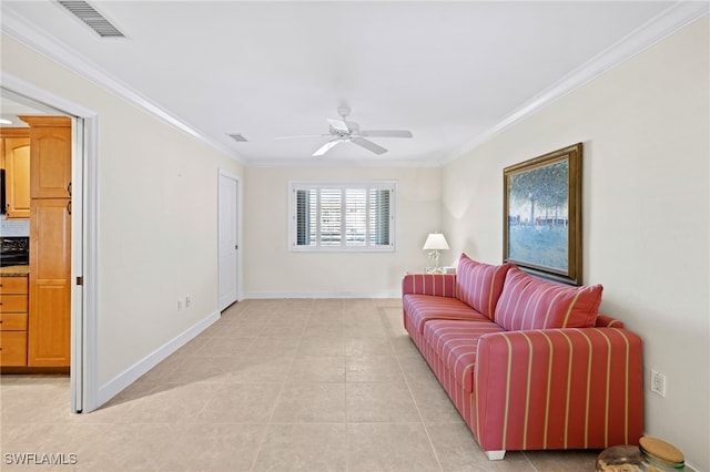 tiled living room featuring ceiling fan and ornamental molding