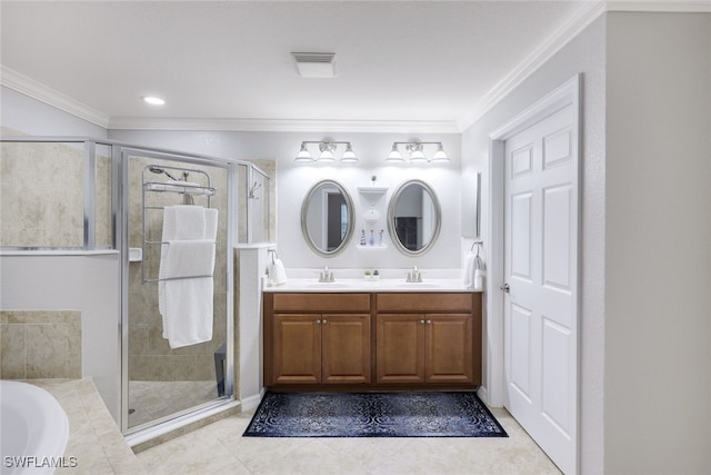 bathroom with tile patterned floors, crown molding, vanity, and shower with separate bathtub