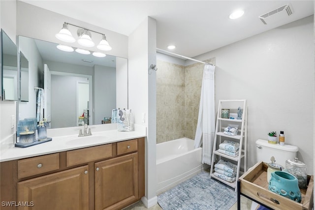 full bathroom with vanity, shower / bathtub combination with curtain, and toilet