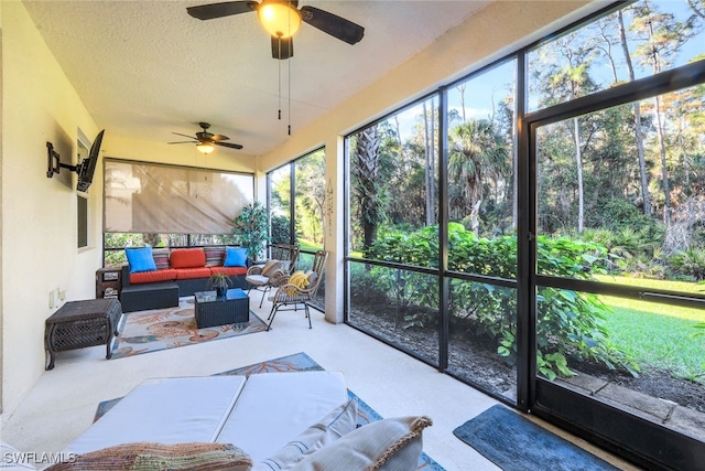 sunroom / solarium with ceiling fan