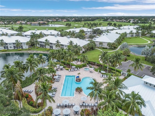 birds eye view of property featuring a water view