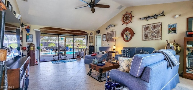 living area with light tile patterned floors, visible vents, lofted ceiling, and a ceiling fan