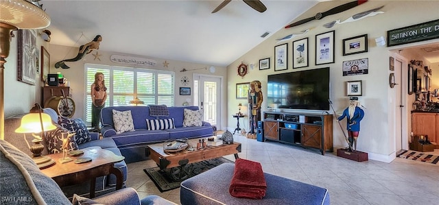 living room with tile patterned floors, visible vents, baseboards, lofted ceiling, and ceiling fan