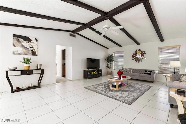 tiled living room featuring vaulted ceiling with beams and ceiling fan