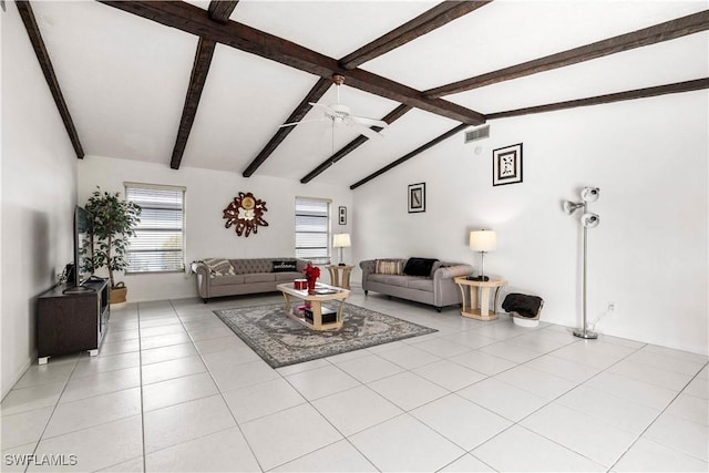 tiled living room featuring ceiling fan and vaulted ceiling with beams