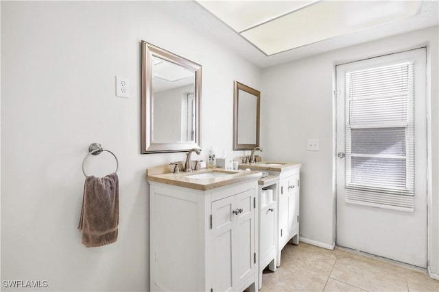 bathroom with vanity and tile patterned floors