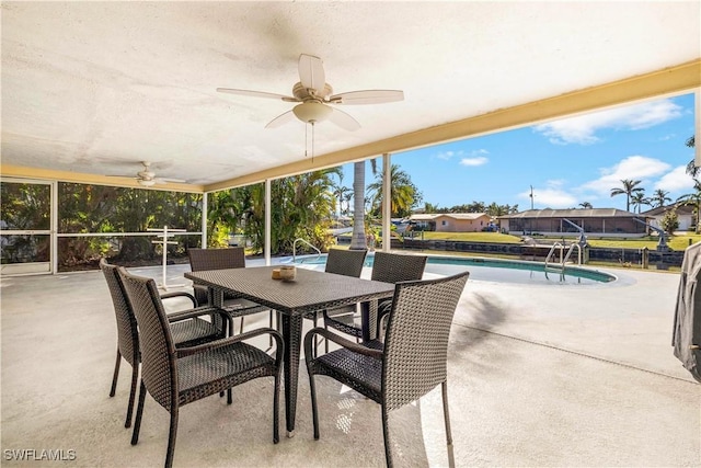 view of patio featuring ceiling fan