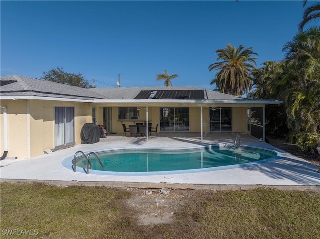 view of pool featuring a patio area