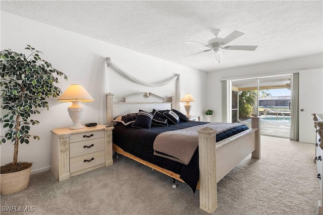 bedroom featuring ceiling fan, access to exterior, light carpet, and a textured ceiling