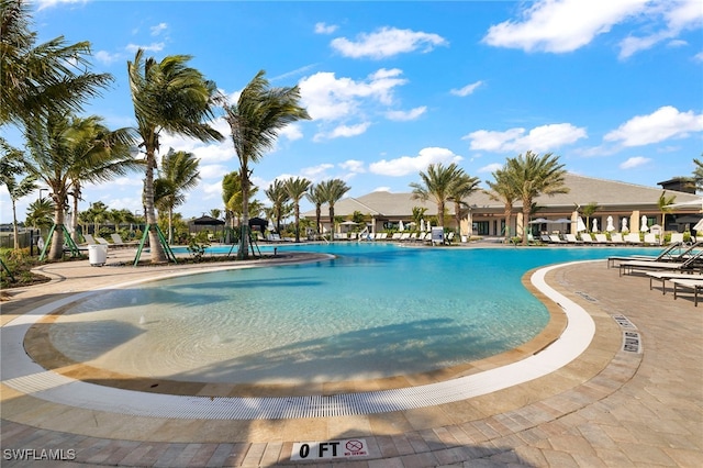 view of swimming pool featuring a patio area