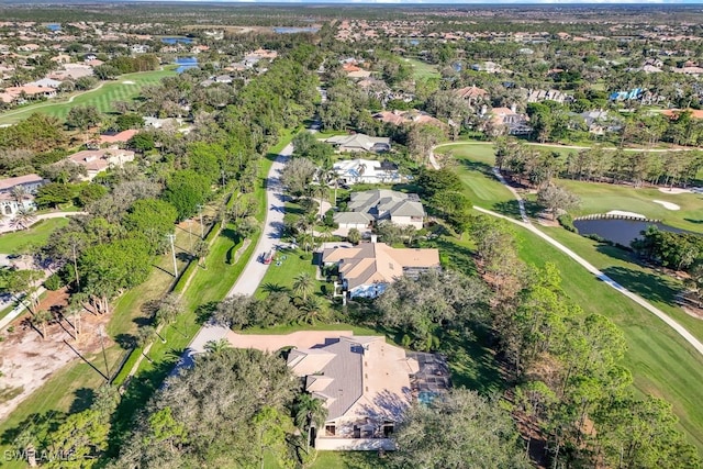 4556 Pond Apple Dr N, Naples, FL 34119 - aerial view of property's location featuring nearby suburban area, a golf course, and a large body of water