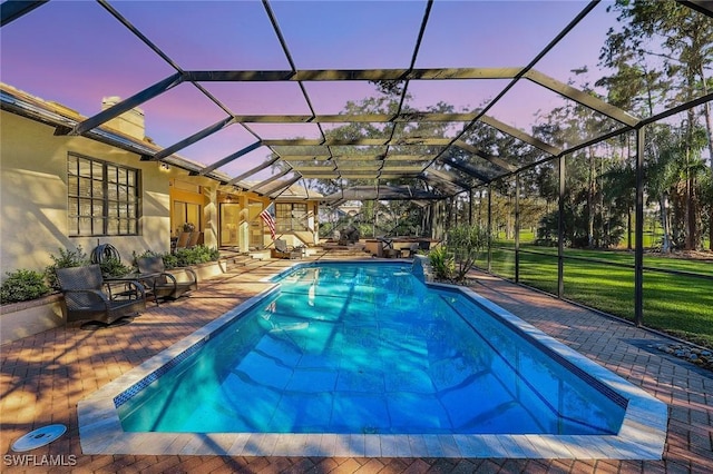 4556 Pond Apple Dr N, Naples, FL 34119 - outdoor pool with a patio and a lanai