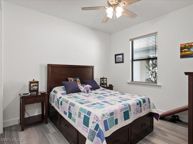 1894 Mesa Ln, Naples, FL 34120 - bedroom featuring light wood-type flooring, baseboards, and ceiling fan