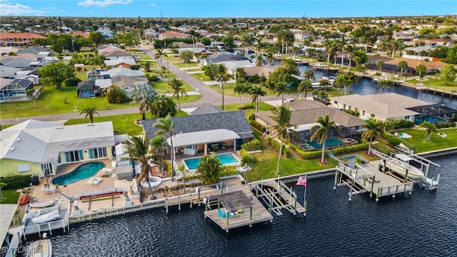 drone / aerial view with a water view