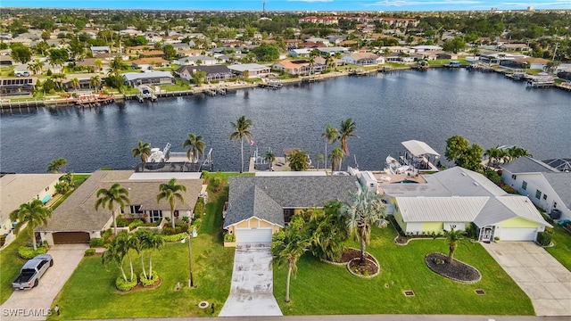 drone / aerial view featuring a water view