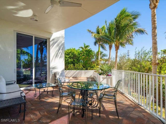 exterior space featuring ceiling fan