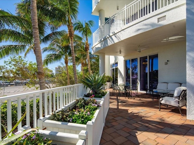 view of patio / terrace with a balcony