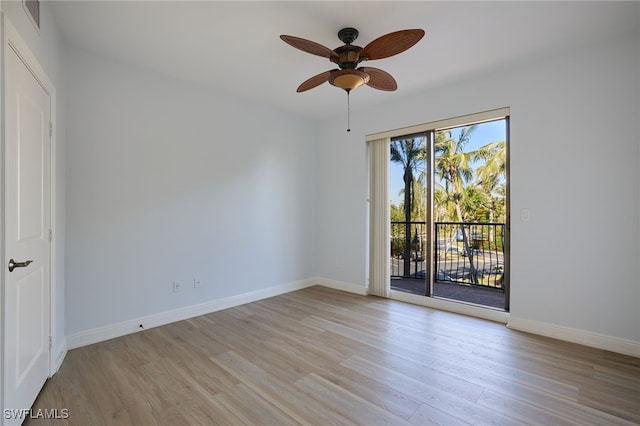 spare room with ceiling fan and light hardwood / wood-style flooring