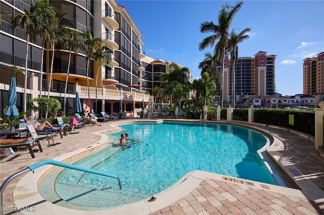 view of swimming pool featuring a patio