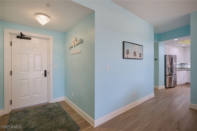 entrance foyer with hardwood / wood-style flooring