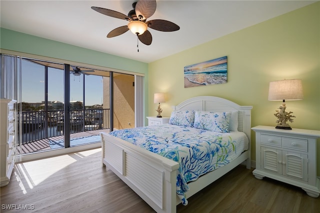 bedroom featuring access to outside, dark hardwood / wood-style floors, and ceiling fan