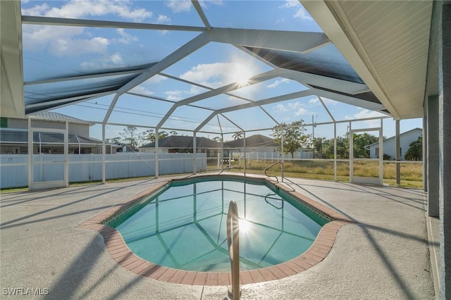 view of pool featuring a lanai and a patio