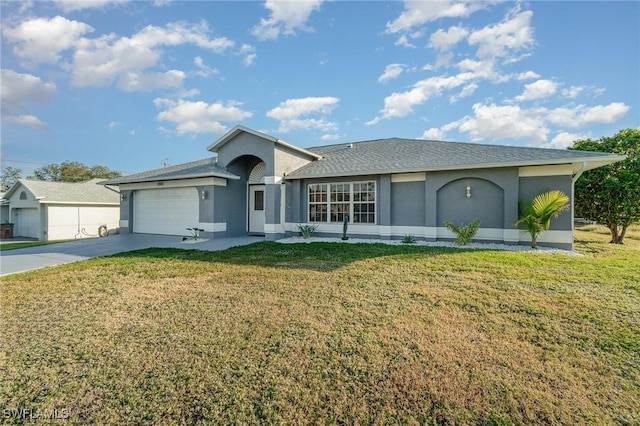 single story home featuring a front yard and a garage