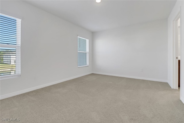 view of carpeted spare room