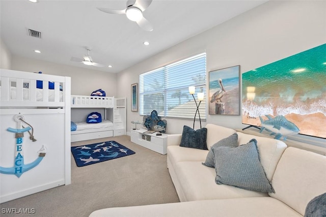 carpeted bedroom featuring recessed lighting, visible vents, and ceiling fan