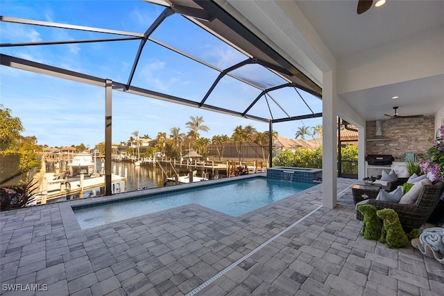 view of swimming pool featuring a water view, a boat dock, a lanai, an in ground hot tub, and a patio