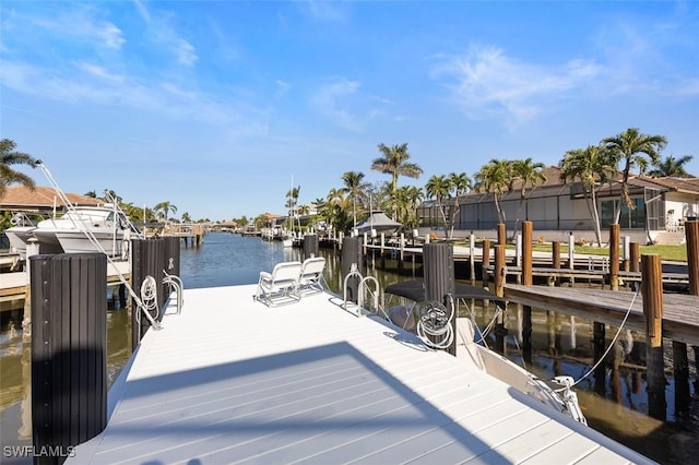 dock area featuring a water view