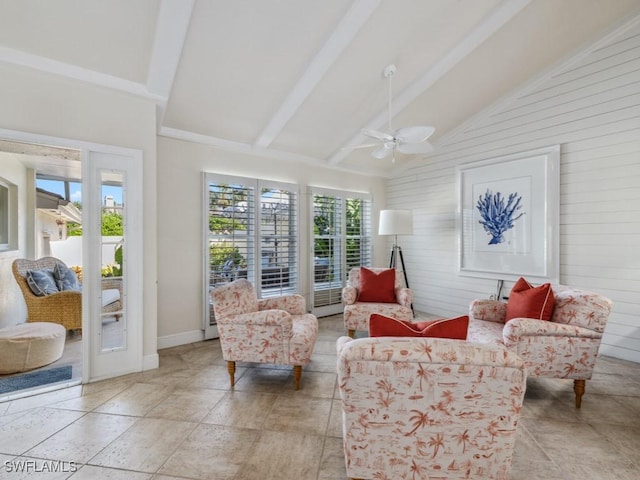 interior space featuring vaulted ceiling with beams, ceiling fan, and a healthy amount of sunlight