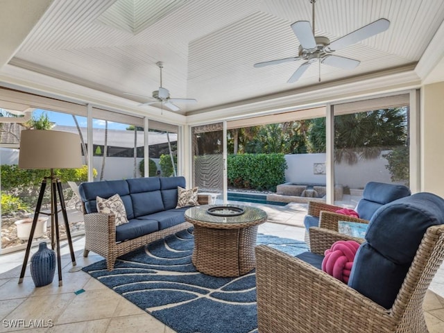 sunroom / solarium with ceiling fan