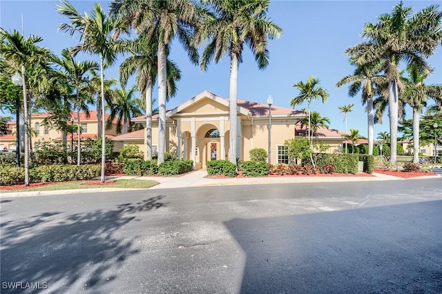 4241 Bellasol Cir Unit 1922, Fort Myers, FL 33916 - view of front of home featuring stucco siding