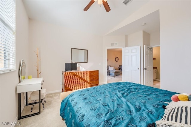 bedroom featuring ceiling fan and light carpet