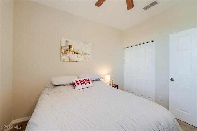 bedroom with ceiling fan, a closet, and carpet floors