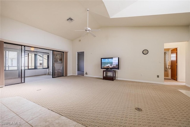 unfurnished living room with high vaulted ceiling, light colored carpet, and ceiling fan