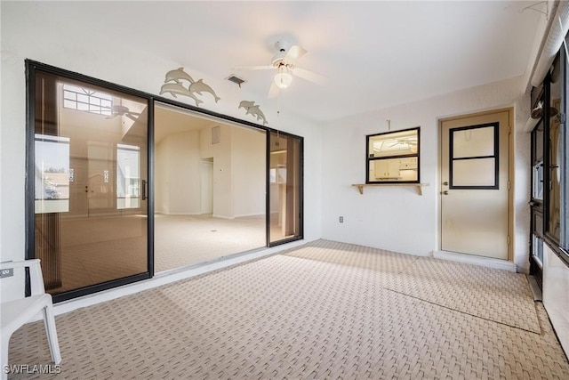 interior space featuring heating unit and ceiling fan