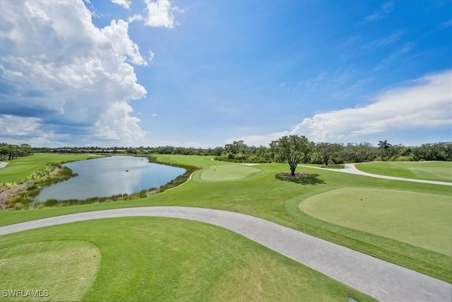 surrounding community featuring a water view