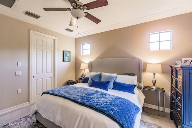 bedroom featuring light carpet, ceiling fan, and ornamental molding