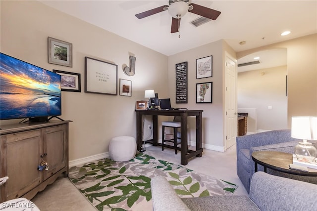 interior space featuring ceiling fan