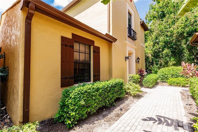 9153 Chula Vista St Unit 13204, Naples, FL 34113 - view of side of home with stucco siding