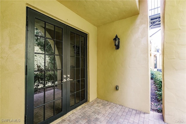 doorway to property featuring french doors